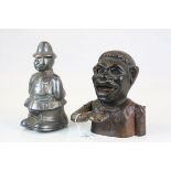 Cast iron money box plus another money box in the form of a Policeman (2)