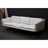 Retro 1960's / 70's White Leatherette Three Seater Sofa raised on Chrome Angular Base, 204cms long x