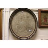 An early 19th century oval needlework panel depicting a map of England and Wales 49 x 43cm