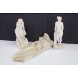 Alabaster Figure of a Semi-Naked Lady reclining on Rocks, 32cms long together with Two Parian Ware