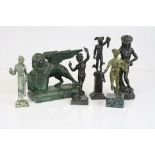 A collection of bronze and spelter figurines in classical pose.