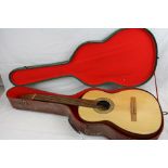 Guitar - A Spanish acoustic guitar with label for the retailer Rodolfo Prados, Malaga. Comes with