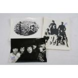 Music Autographs - Three Rolling Stones signed photos / promo stills to include all five band