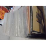 Vinyl - Approximately 90 LPs spanning the decades and genres, condition varies