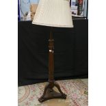 Mahogany Telescopic Standard Lamp with acanthus carving and claw foot tripod base, with silk shade