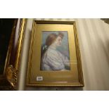 A gilt framed oil painting portrait of a young lady wearing blue ribbons, 33 x 20.5cm