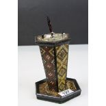 Early 20th century, hat pin stand with painted parquetry style decoration together with hatpins