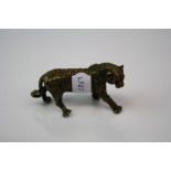 A brass/bronze figure of a tiger