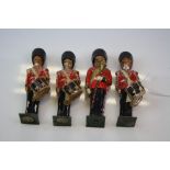 Collection of four vintage Scots Guards band leader & Military marching drummer figures.