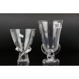 A Steuben art glass crystal vase with spiral decoration and a similar mid century vase with