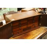 An Edwardian mahogany ten drawer collectors cabinet