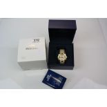 A cased ladies Festina quartz watch with Gem set bezel.