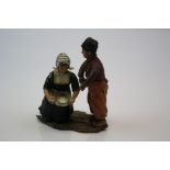 Pair of antique cold painted spelter Dutch figures on base.