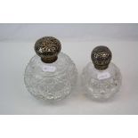 Two Fully Hallmarked sterling silver topped cut glass scent bottles.