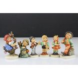Six Goebel Hummel Figures including Merry Wanderer, Apple Tree Girl, Serenade, Girl with Doll, Boy