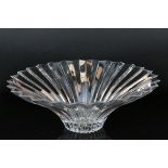 A contemporary cut glass bowl with geometric edged design and fluted side decoration .