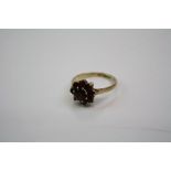 A Fully hallmarked 9ct gold and garnet ladies ring.