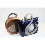 Two Handbags - Ameiliyar Swan Handbag, 36cms wide together with a Battery Operated Clock Handbag,