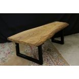 Hand Crafted Coffee Table, the top made from a single plank of oak and raised on wrought iron