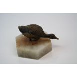 Cold painted duck on marble base