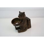Black forest matchbox holder and ashtray in the form of a bear.