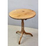 Early 19th century Circular Tilt Top Supper Table raised on Pedestal Base with Three Splayed Feet,