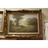Oil on Canvase of Landscape Scene signed Reg Brown, 40cms x 60cms, gilt framed