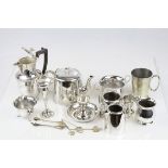 A quantity of silverplate to include teapots ,jugs candlestick etc.