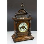 Late Victorian Eight Day Oak Cased Mantle Clock, the white enamel dial with Roman Numerals, 46cms