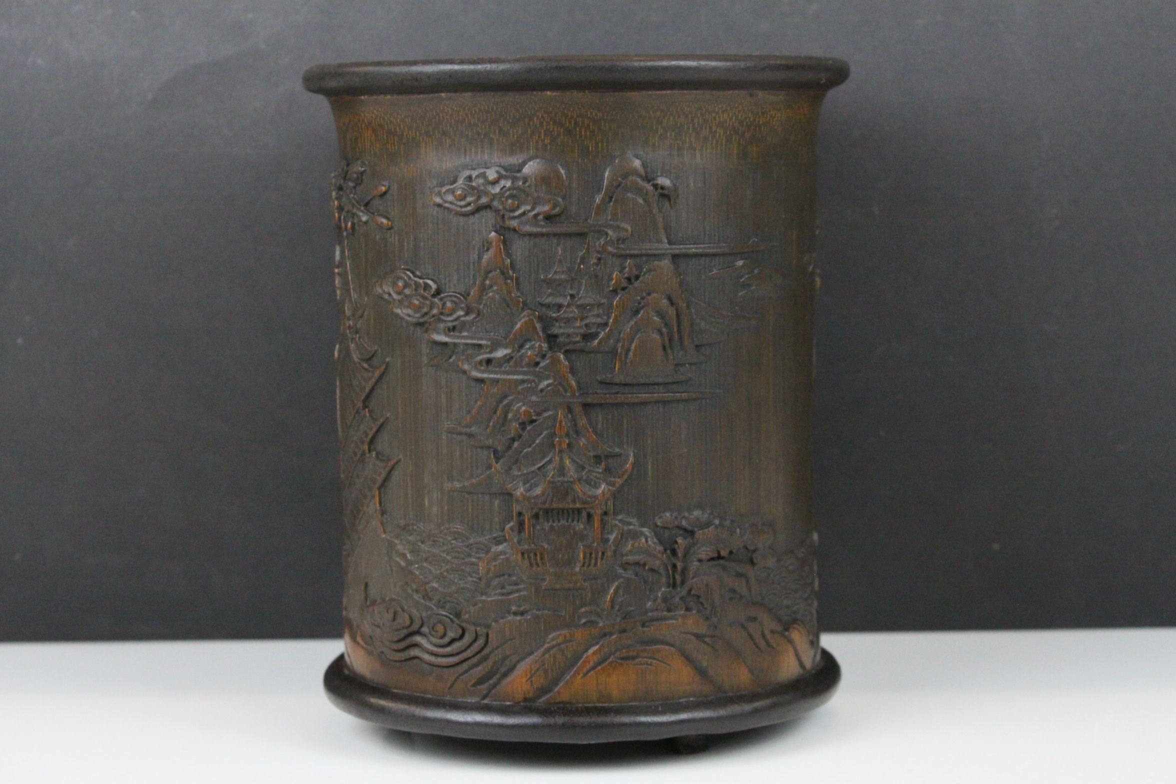 Chinese Hardwood Brush Pot intricately carved with a Temple Scene, 18.5cms high