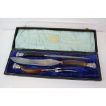 Cased carving set to include knife, fork and steel.