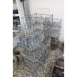 Ten Vintage Metal Milk Bottle Crates, each approx. 46cms long