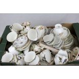 A large quantity of cups and saucers to include Paragon, Royal Staffs and Tuscan etc.
