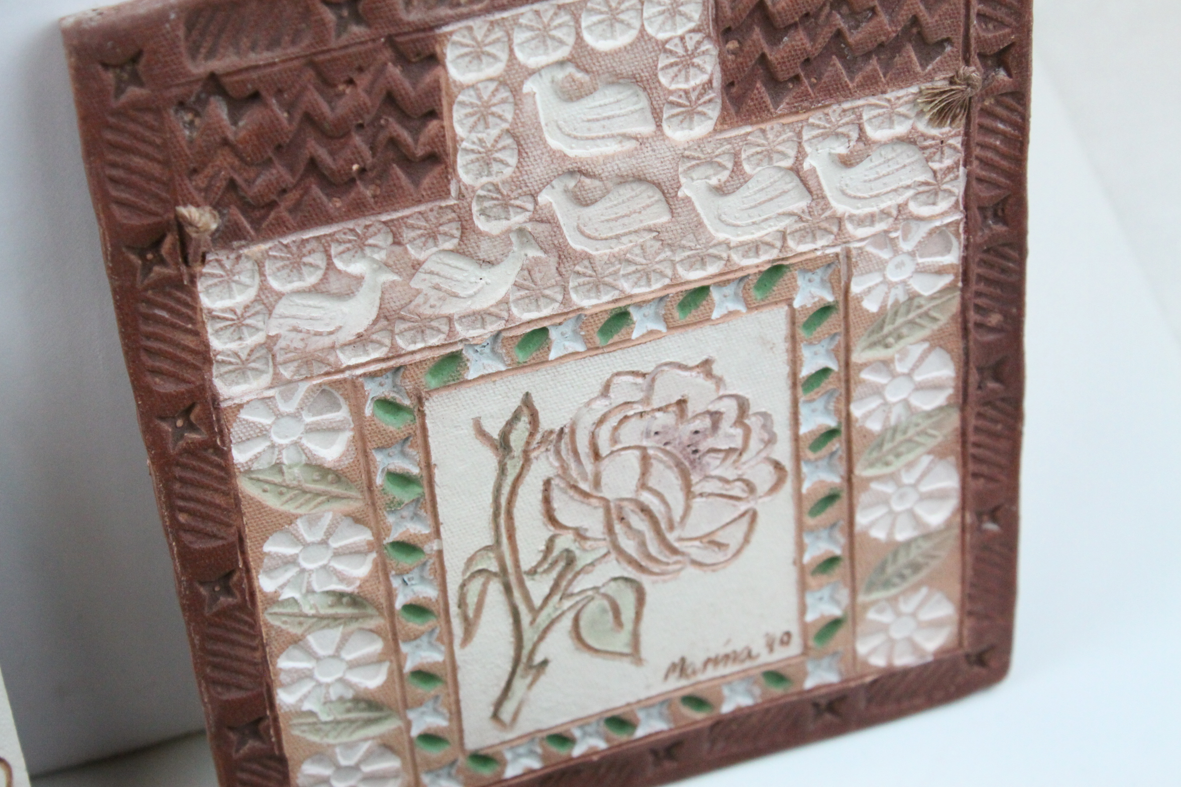 A quantity of late 20th century teracotta decorated tiles. - Image 2 of 5