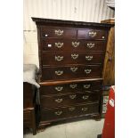 George III Mahogany Chest on Chest, the upper section with dentil cornice above two short and