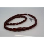 Cherry Amber Bakelite Barrel-shaped Bead Necklace, graduating sized beads, 70cms long