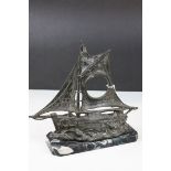 Art Deco Spelter Watch Holder in the form of a Sailing Boat on a Faux Marble Plinth, 26cms high