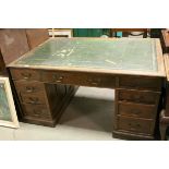 Oak Pedestal Partners Desk with green leather inset top, arrangement of Nine Drawers to one side and
