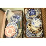 Two suitcases containing large quantity of ceramics mainly blue and white together with a boxed