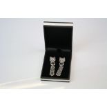 Pair of Silver Panther designer style Drop Earrings with Ruby Eyes