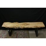 Hand Crafted Bench, the seat made from a single plank of oak and raised on wrought iron legs, 149cms