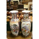 Pair of large oriental style contemporary vases with figuartive decoration
