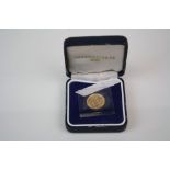 A British Minted 2002 Gold Half Sovereign Coin In Uncirculated condition complete with