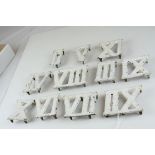 Eleven Painted Metal Roman Numerals, each 9cms high