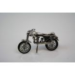 Unusual Silver Model of a Motorbike with rubber tyres part articulated