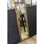 19th century French Rectangular Wall Mirror contained within a Distressed Gilt Foliate Frame, 140cms