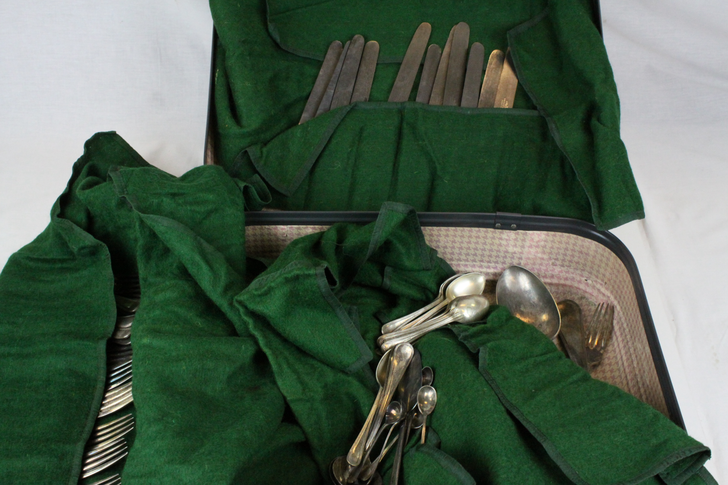 A suitcase containing large quantity of Mapping and Webb flatware and cutlery.