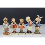 Five Goebel Hummel Figures including Baker, Boy with Toothache, Doctor, Little Shopper and School