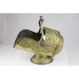 Victorian Brass Helmet Shaped Coal Scuttle with embossed foliate scroll decoration, 45cms high