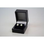 Pair of Silver and Opal Stud Earrings